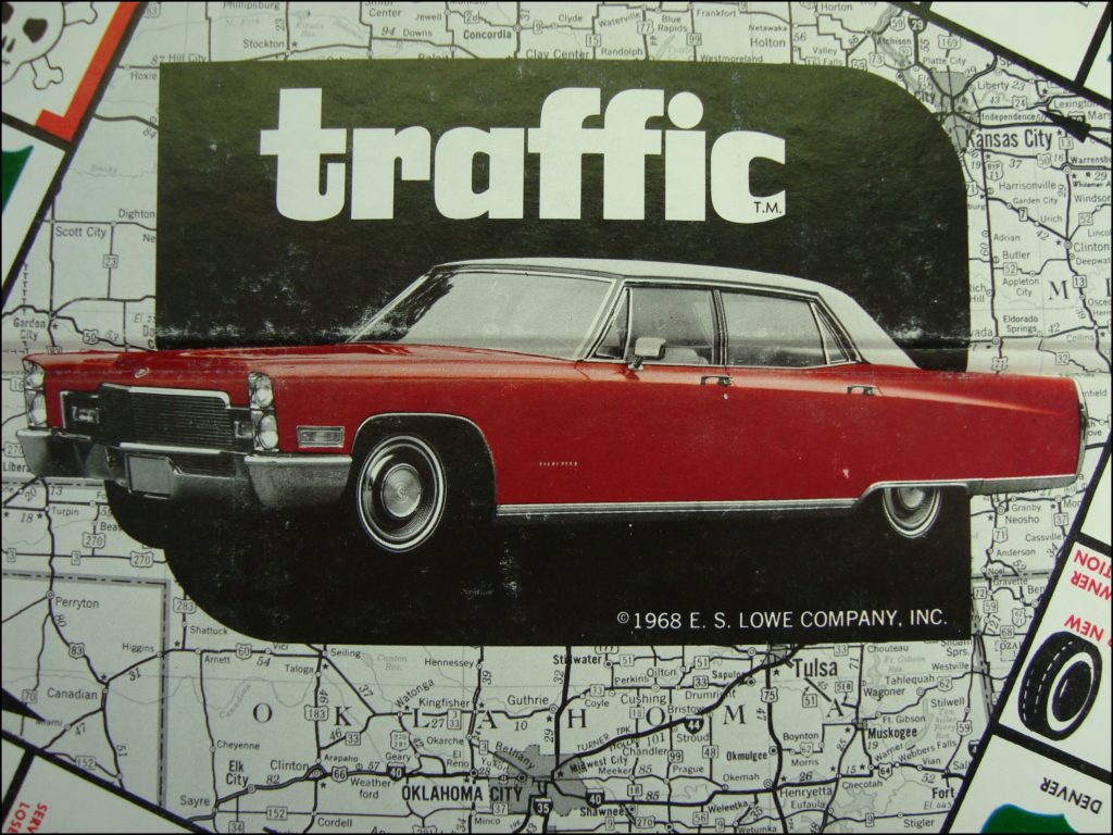 Brettspiel ; Board game ; Jeu de société ; 1968 ; Traffic ; Lowe Company ; Opel ; Pontiac ; Buick ; Cadillac ; Oldsmobile ; Chevrolet.  